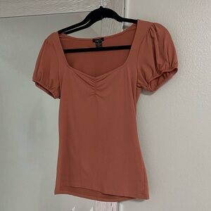 Pink puff sleeve women’s top